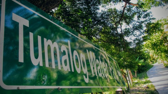 Look for this sign board Tumalog Water falls as your landmark. 